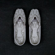Off White Textured Rexine Closed Toe Jutti