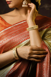 Opulent Legacy Kundan Pearl Kadas - Dyulokha