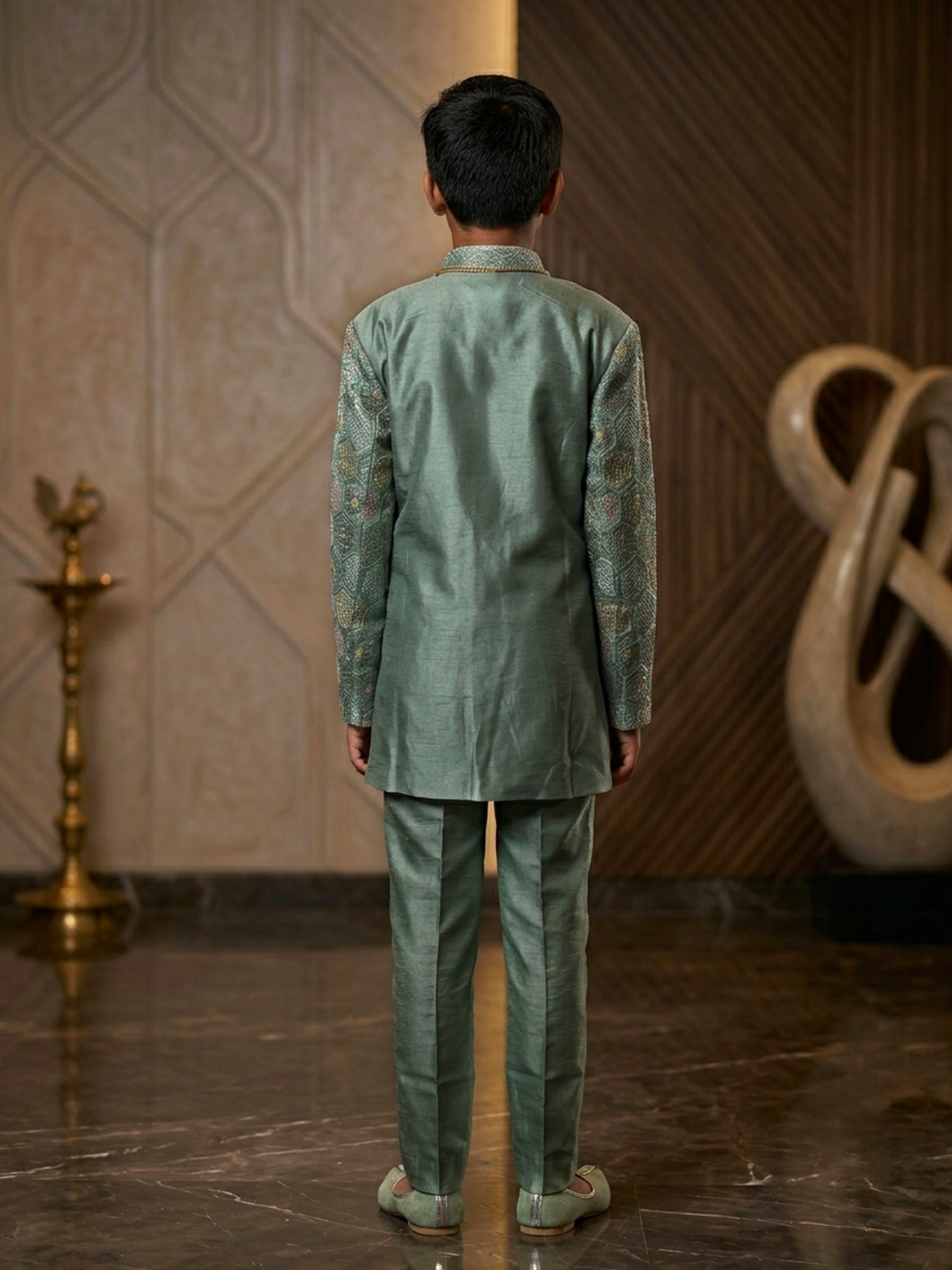 Transform your presence in this exquisite embroidered sherwani