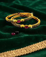 Bangles with Bold Pink and Black Accents