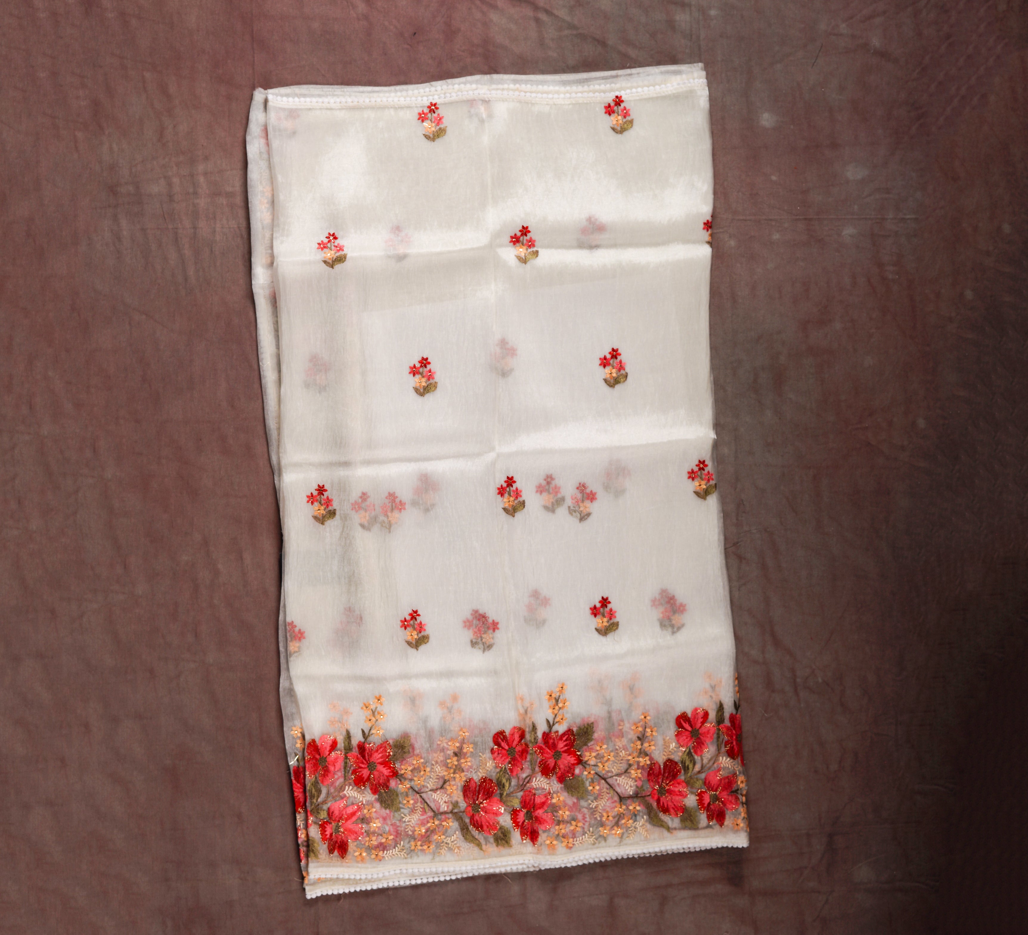 Unveil Timeless Beauty with an Off White Organza Silk Saree