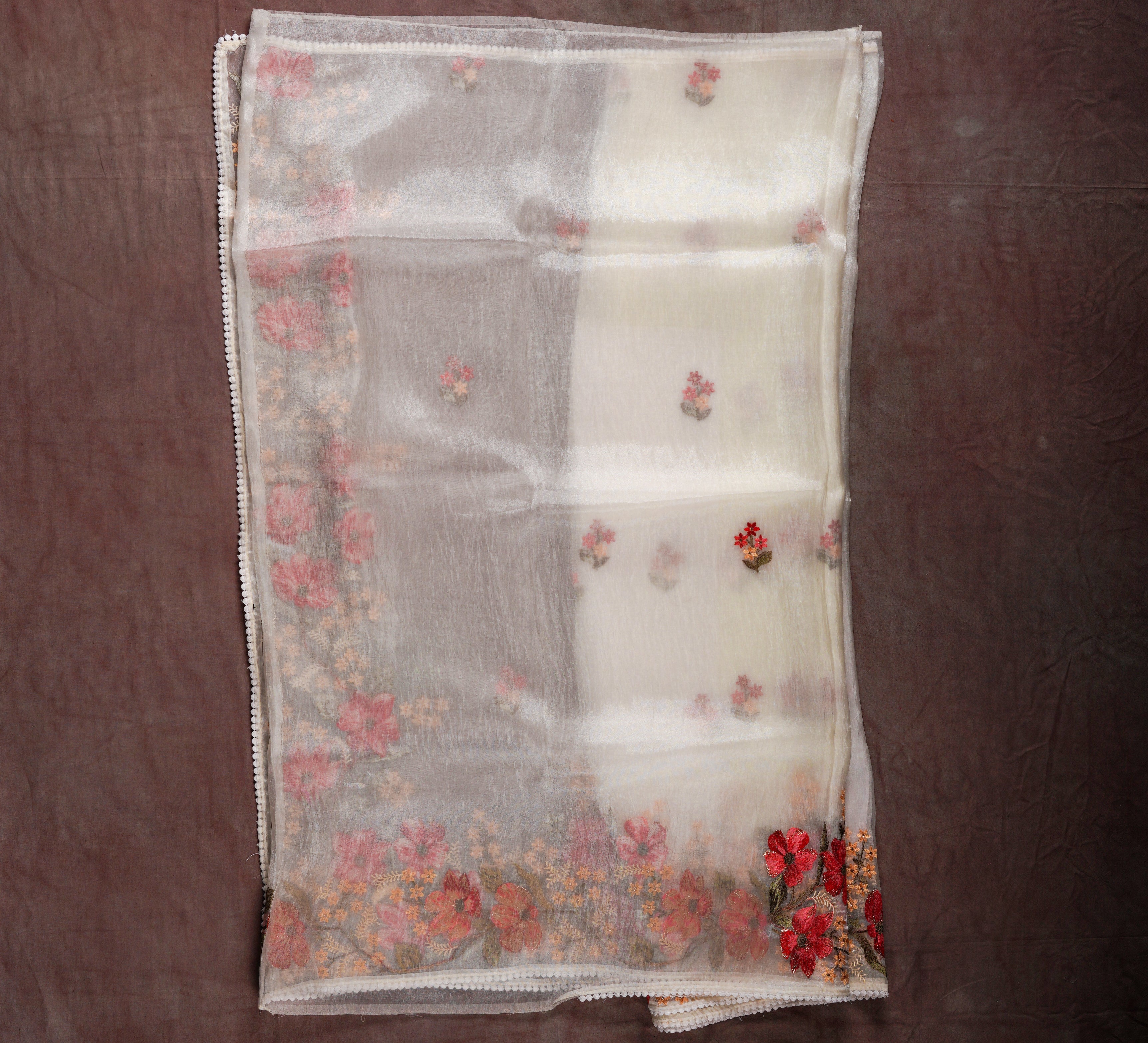 Unveil Timeless Beauty with an Off White Organza Silk Saree