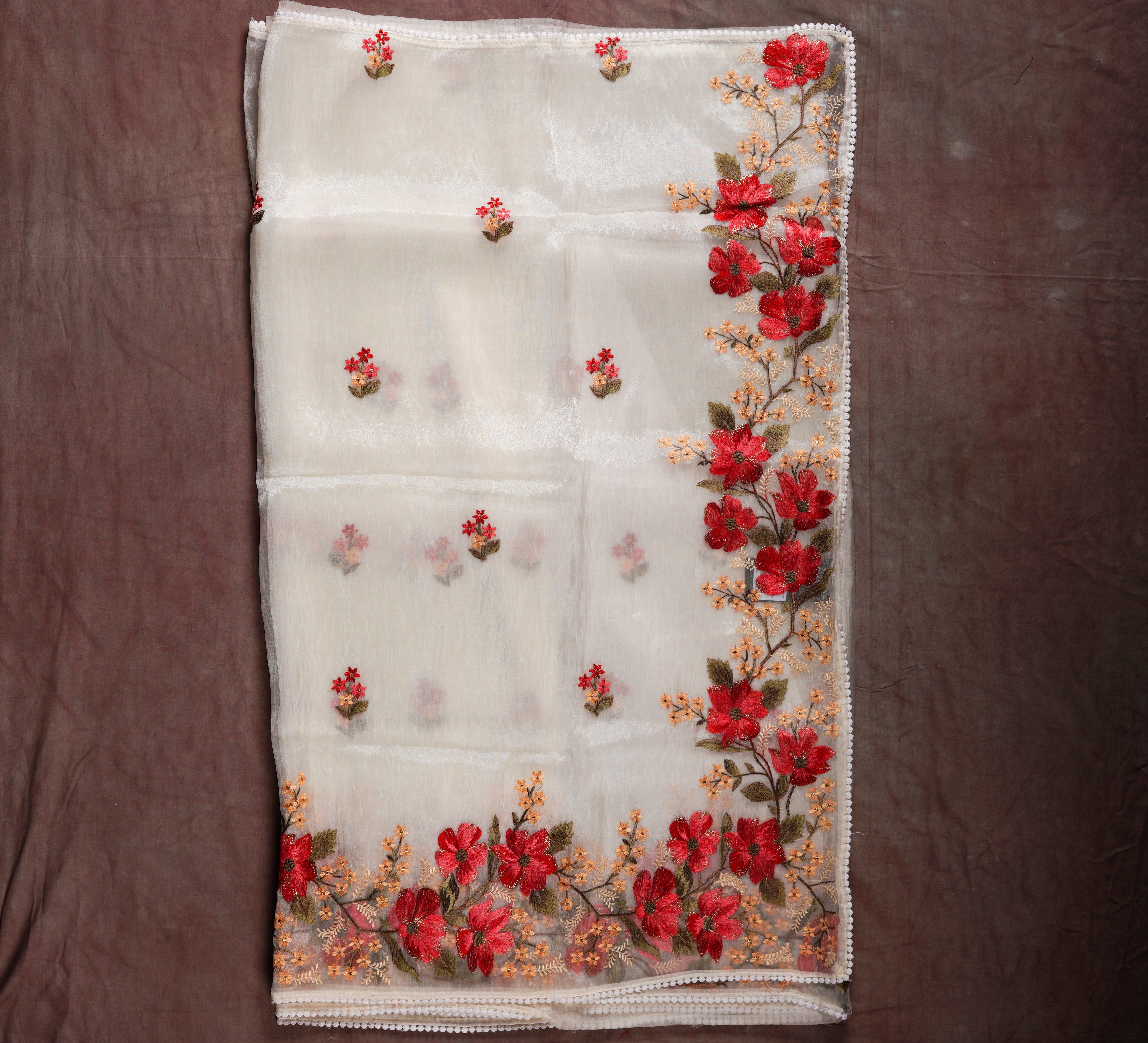 Unveil Timeless Beauty with an Off White Organza Silk Saree