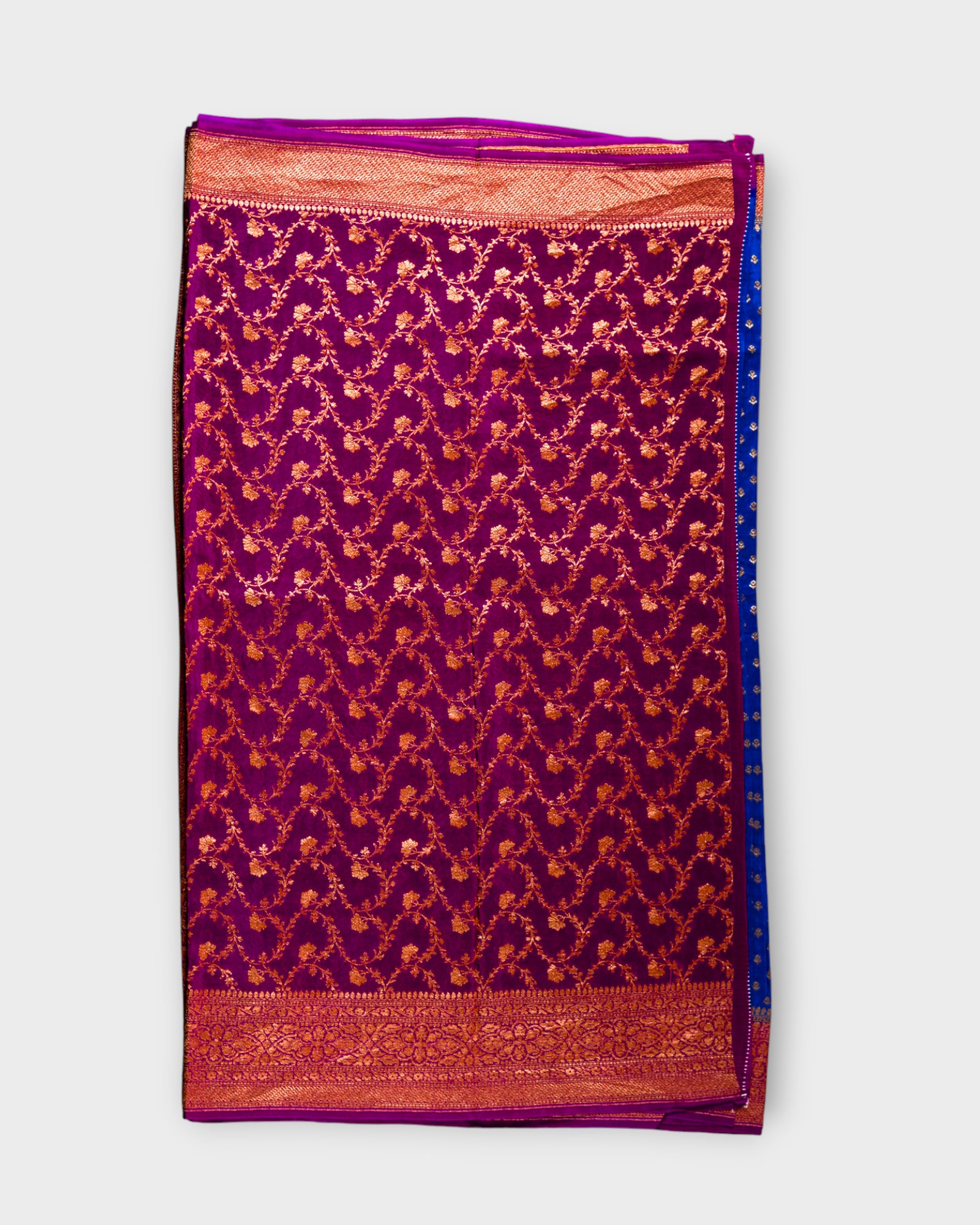 Peacock Blue Georgette Zari Woven Saree