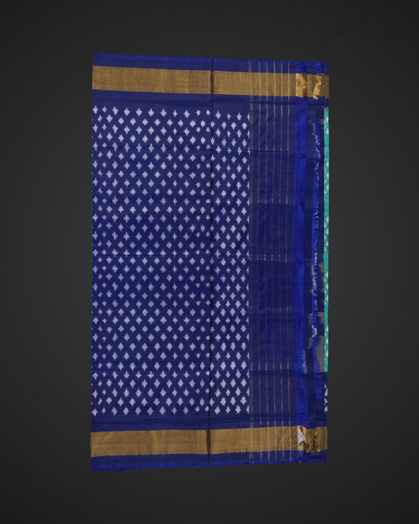 Teal Ikkat Silk Woven Saree